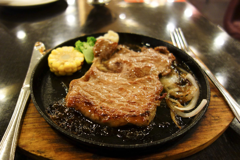 Back to China - Shanghai - Nanjing - Hangzhou - 2012 - I chose my dinner purely to see what it would be! It said Aussie sirloin steak on the menu. What came was actually ok. It was on a hot plate already c