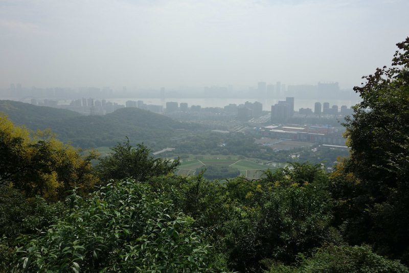 Back to China - Shanghai - Nanjing - Hangzhou - 2012 - This is the view down the far side of the hill. The buildings on the left along the bank of the river are whats called the new city. Until now I didnt