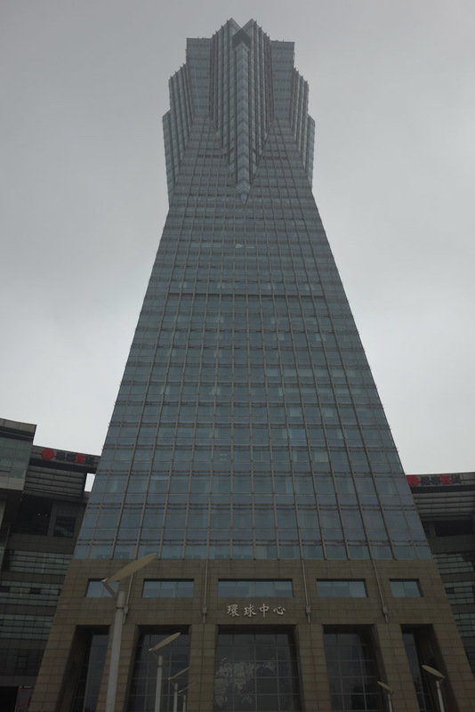 China-Hangzhou-Shanghai-Train - Just another random ominous looking building punching a hole through the smog layer, which was particularly bad today. On the train ride between the t