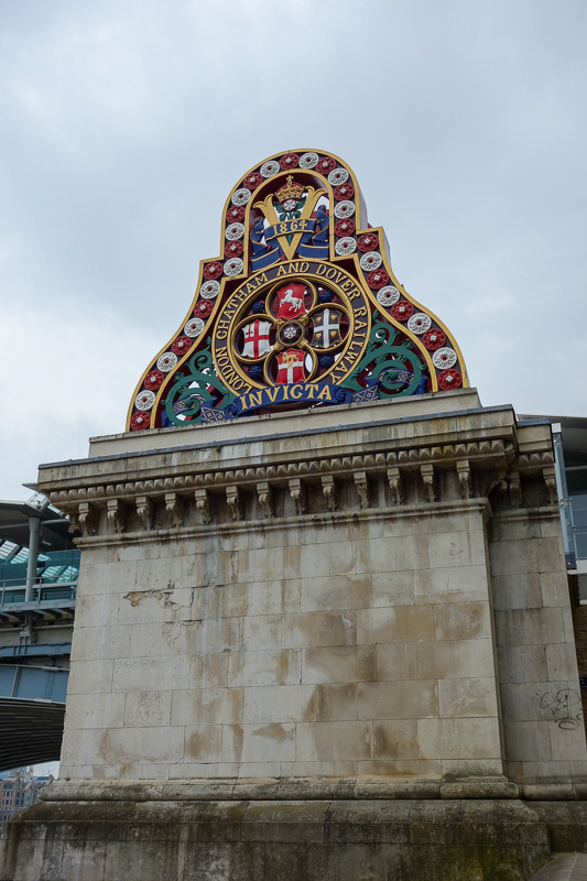 England-London-Tower Bridge-Burrough Market - London decorates mundane things with crests, shields, seals and secret handshakes.