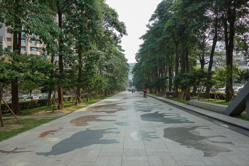 Hong Kong - Japan - Taiwan - March 2014 - This is the walkway to the natural science museum. It has marble dinosaur inlays. There really arent many trees in Taichung! This few hundred metres o