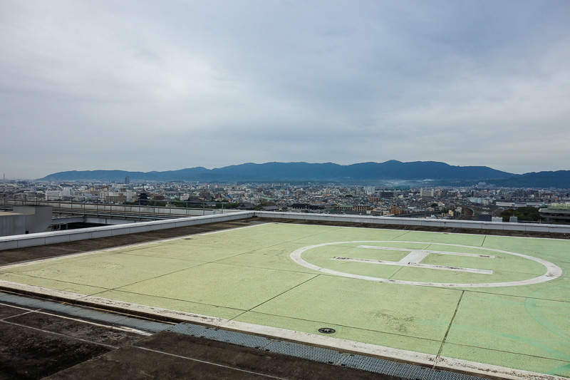 Visiting 9 cities in Japan - Oct and Nov 2016 - Cloudy and smoggy sky today. I have taken this photo before on a previous trip, its the only place on the roof you can get around the darkly tinted gl