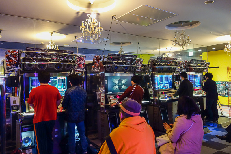 Visiting 9 cities in Japan - Oct and Nov 2016 - Dance dance revolution is old hat, its Super DJ Battle now. A crowd has formed to watch these guys ghost fade the decks.
