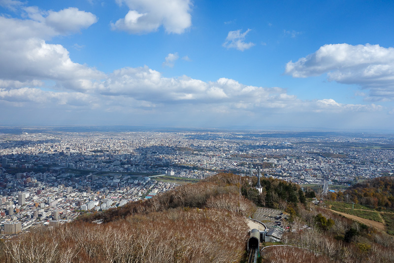 Visiting 9 cities in Japan - Oct and Nov 2016 - More Sapporo, and the middle cable car station about 1/3 of the way down, with more car parking. I never saw this on the way up, the walking path goes