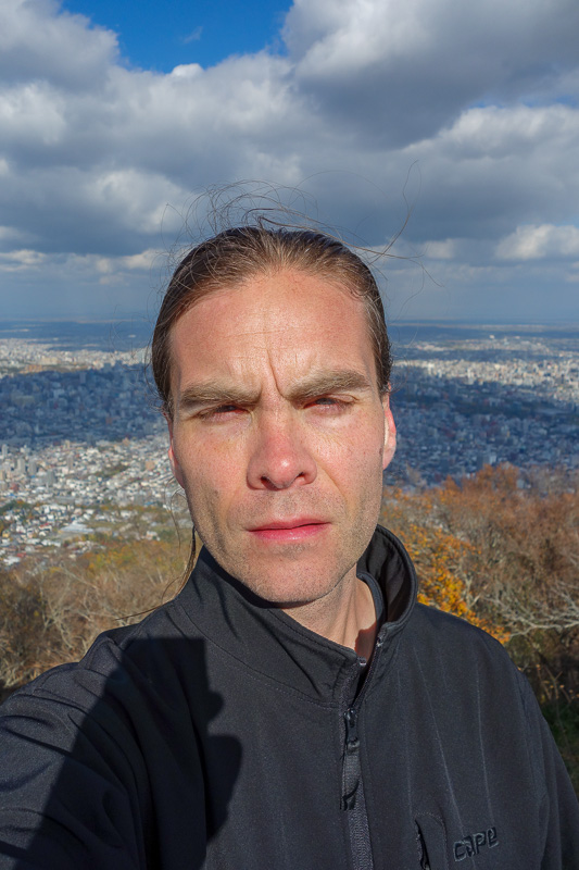 Visiting 9 cities in Japan - Oct and Nov 2016 - Do I look cold? The glare was ridiculous, I couldnt open my eyes for the selfie.