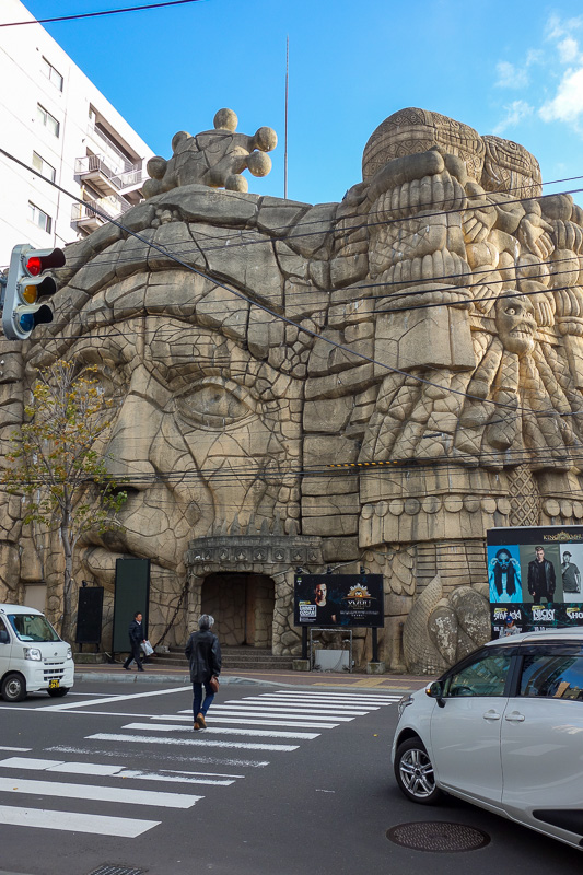 Visiting 9 cities in Japan - Oct and Nov 2016 - And then I arrived at the 'Girls Cafe and Slot' faux rock mountain building. Now to clean the mud off my pants that got there because I cleaned the mu