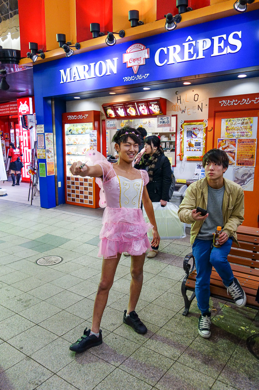 Visiting 9 cities in Japan - Oct and Nov 2016 - This guy seemed particularly embarrassed as his friends took his photo, so it was great amusement to them all when I joined them for photo taking. Loo