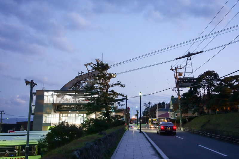 Visiting 9 cities in Japan - Oct and Nov 2016 - Here I am at the bottom cable car station, there is a huge parking area for buses. Actually Hakodate seems like Toyama in that everything is parking.