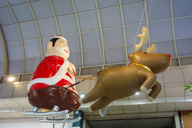 Visiting 9 cities in Japan - Oct and Nov 2016 - Japanese santa. Someone has replaced a fat white man with a fat Japanese man. Cultural misappropriation.