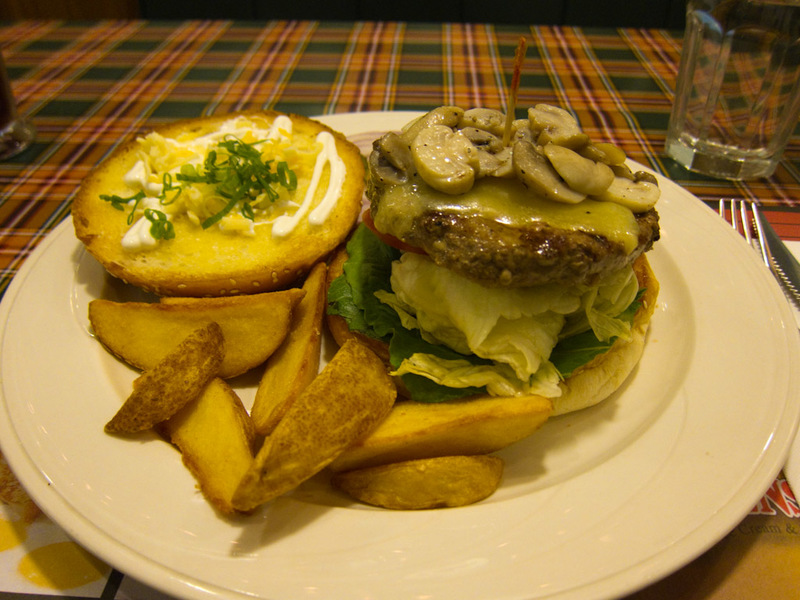 Japan and Taiwan March 2012 - Second course, mushroom burger. It was pretty great! So were the chips with the skin left on.
