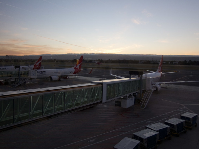 Sydney-Airport-Lounge - Sunrise at Adelaide airport. All parking spots were full, and there were a few planes round the back in the stand off area too. Nice morning you can s