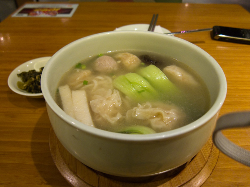 China-Beijing-Station-Dumplings - My dinner. They had beef noodle soup and some nice looking dumplings on the menu, but I decided I should have something different, this is fish ball a