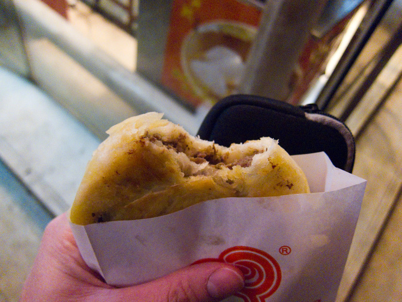 China-Beijing-Wudaokou-Burrito - Dinner part 1. I lined up and was rewarded with this beef pie. It was fantastic. The pastry was cruncy on the outside but flaky in the middle. The mea