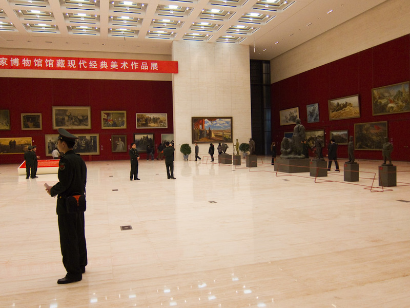 China-Beijing-Garden-Museum-Market - Inside the hall of glorious portraits of the dear leader.