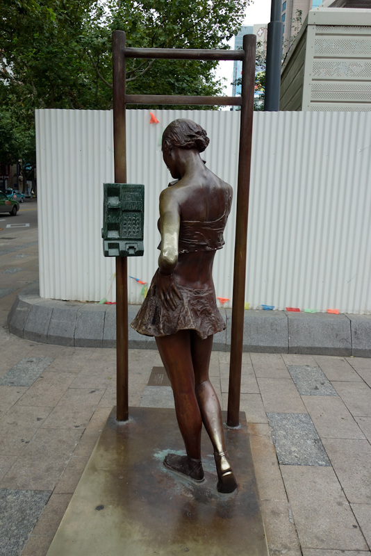 China-Shanghai-Station - I presume this monument is dedicated to all the girls who talk on the telephone and forget that their skirt has blown up in the wind. And thats as goo