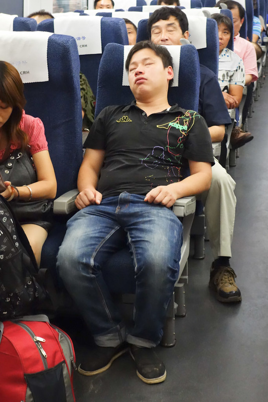 China-Suzhou-Garden-Architecture - I boarded my train back to Shanghai and this guy was in my seat. Hes not really asleep. I told him excuse me in Chinese, showed him my ticket. He shru