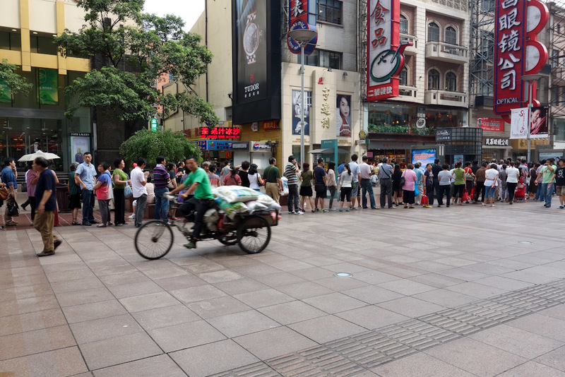 Back to China - Shanghai - Nanjing - Hangzhou - 2012 - This long line is to buy moon cakes from Shanghai food store. Apparently their moon cakes are best. These are bought for the harvest moon festival whi