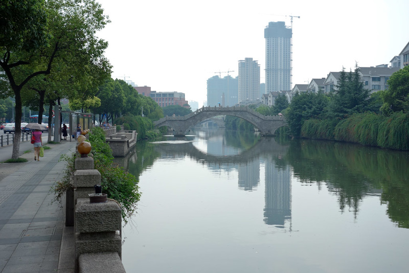 China-Wuxi-Daytrip-Train - The place is known for its canals. There are indeed many canals. Many have bridges over them. I followed these for many miles. If you like canals you 