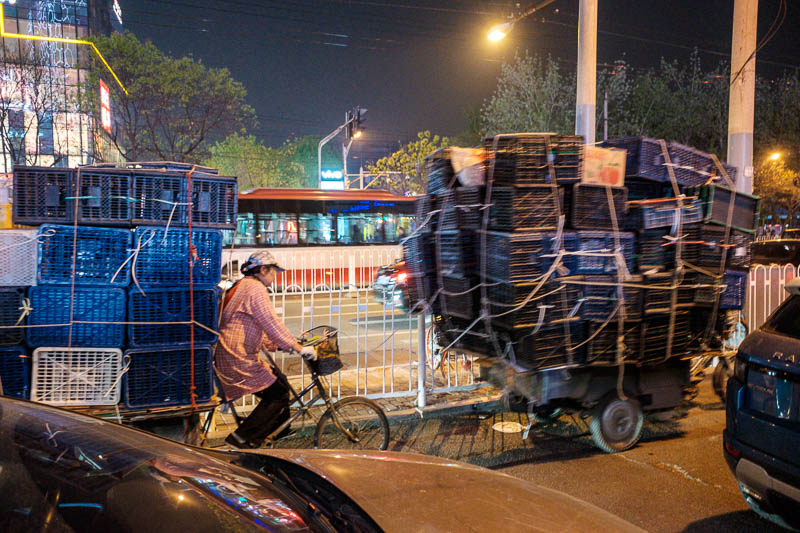 The great loop of China - April 2018 - Sorry about the blurry vision, it was a moving subject in the dark. In amongst the parade of Lamborghinis this went past. A husband and wife transport