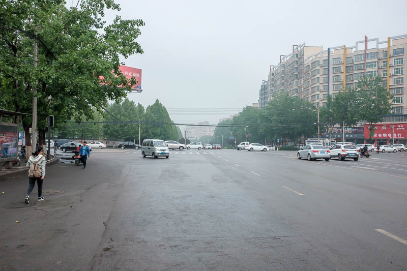 China-Dengfeng-Shaolin-Kung Fu-Rain - I had just enough time to take a photo of a street in Dengfeng out the front of the bus station. Some parts we went through on the bus looked really n
