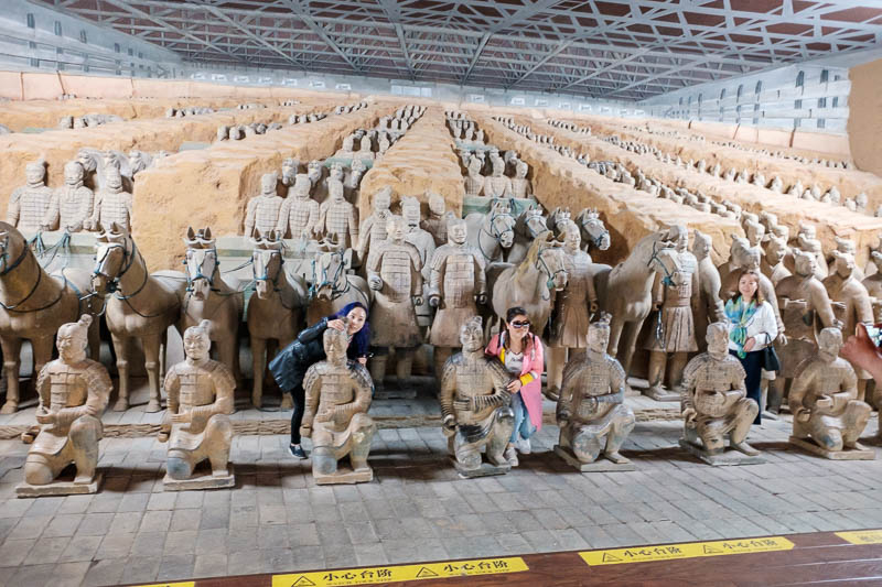 China-Xian-Terracotta Army - If you pay enough money you can have your photo taken with a mummified warrior.