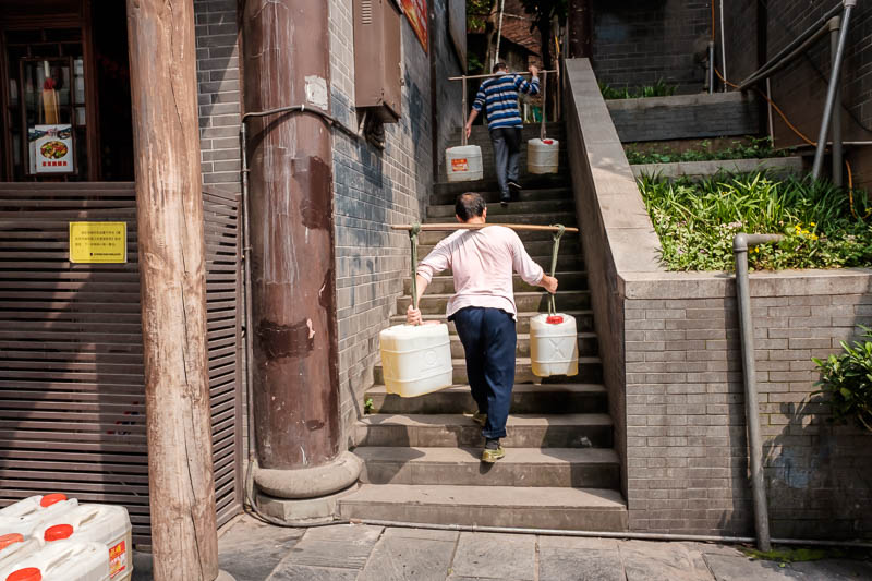 The great loop of China - April 2018 - Due to the steep streets, steps, alleyways etc which I already discussed above, nearly everything in Chongqing is still delivered by people with a bam