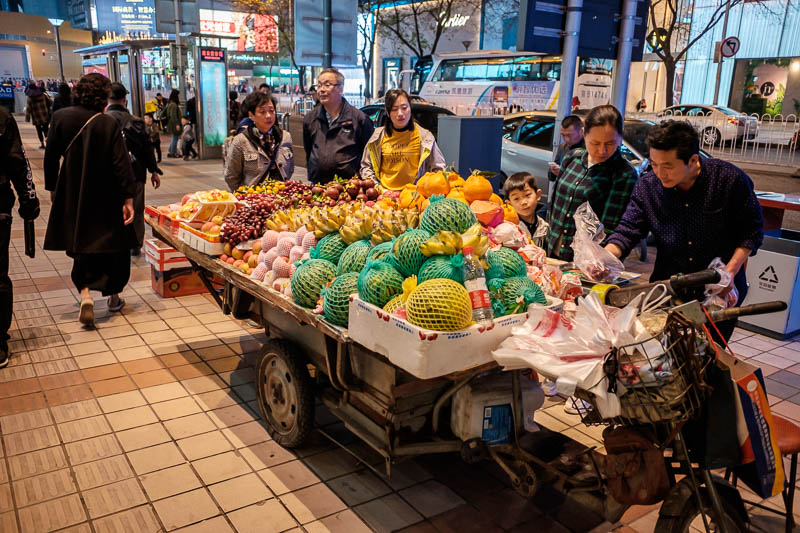 China-Beijing-Food-Wangfujing - You can still also find fruit sellers with their carts. It all looks amazing, but I can only eat fruit if its been cut up for me and put in plastic, l