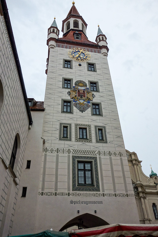 Germany-Munich-Rain - Here is an example of a pre fabricated ancient clock tower. Note the brick lines are painted on.
