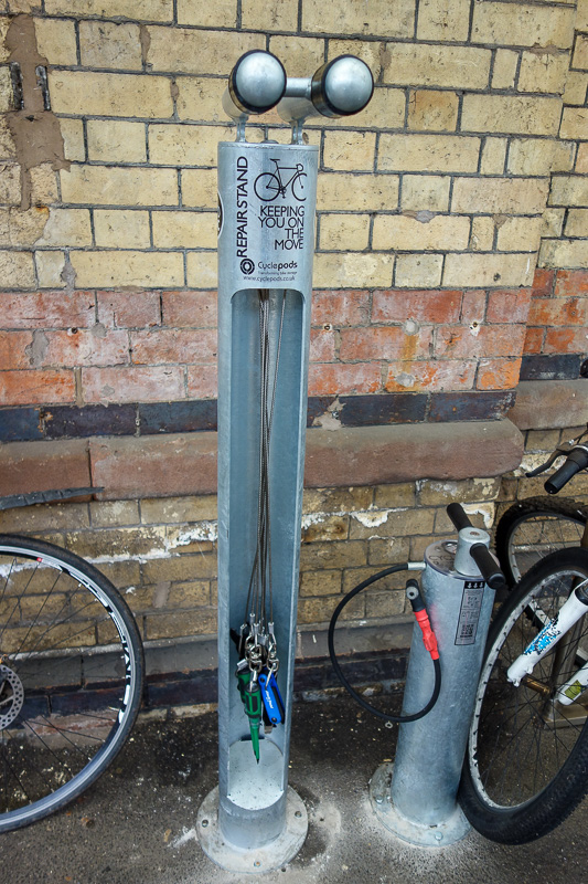 England-Manchester-Mall-China Town-Pho - Later in the day now, and this is on the Warrington train platform. Its a bike repair station with tools. They let you park your bikes on the platform
