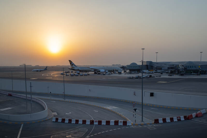 Abu Dhabi-Airport-Lounge-Etihad - These were fast edits, dont expect award winning photos. Dont ever expect that from me. Here is my plane, from afar. Heavy crop at dawn. You can see t