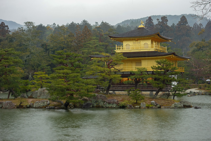 Japan-Kyoto-Rain-Temple-Kinkajuji - This is the golden temple. I must say I am underwhelmed. You pay your $5, step through a gate, there it is, then walk about 200 metres and leave. You 
