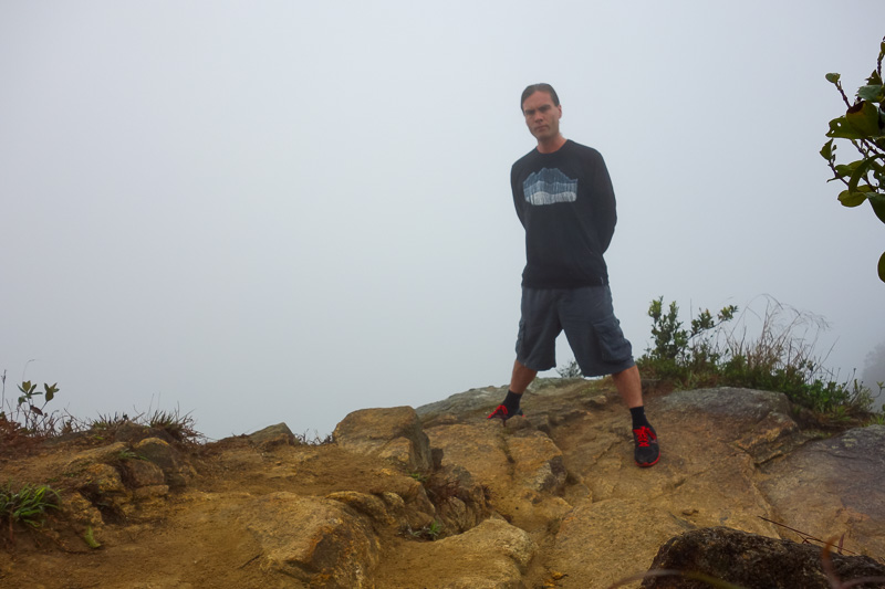 Hong Kong-Hiking-Lion Rock-Fog - Here I am at the top. What an awesome view of fog. Its quite weird being out on the ledge and there being nothing to see below.