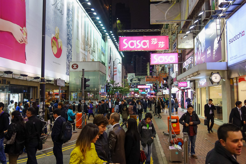 Hong Kong-Causeway Bay-Tram - This is one of many busy shopping streets, where one might find Russians carrying massive amounts of brand name luxury goods.