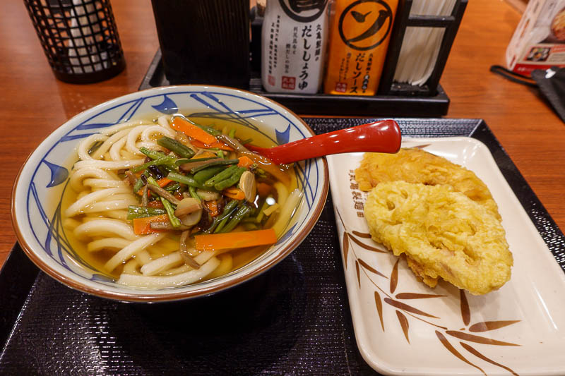 Japan-Hiroshima-Shopping-Udon - For dinner, udon, with what was claimed to be wild local vegetables, which I suspect was frozen vegetables out of a bag. For my deep fried surprises I