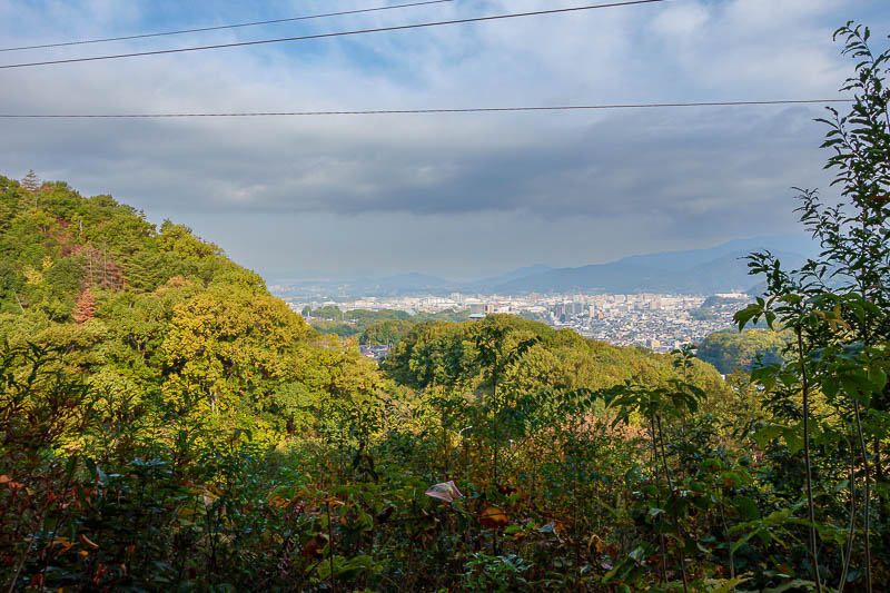 Japan-Hiroshima-Hiking-Shimoyama - View, with wires. Cloud coming.