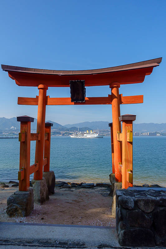 Japan-Hiroshima-Hiking-Miyajima - If you come back this way, which is the wrong way, you get to go past bonus mini gate. And if you time it right, there will be a ship inside the gate.