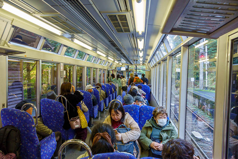 Japan-Kurama-Kibune-Hiking - Final pic before I go do my laundry, the inside of the leaf viewing train with sideways seats.