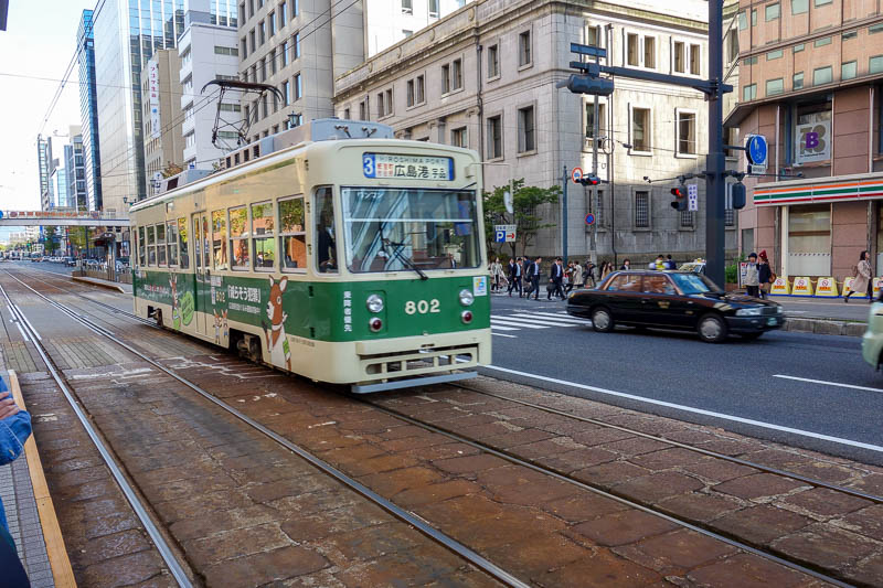 Japan 2015 - Tokyo - Nagoya - Hiroshima - Shimonoseki - Fukuoka - One of the older, but not the oldest kinds of streetcars still in operation. Apparently Hiroshima is a living streetcar museum, and they have bought u