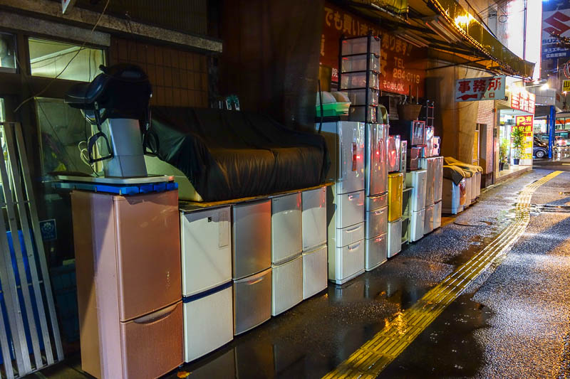 Japan-Hiroshima-Food-Mapo Tofu-Rain - On the wrong side of the tracks, I was able to appreciate that a whitegoods store just leaves their product un guarded on the street all night.