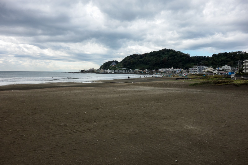 Japan-Kamakura-Hiking-Kenchoji - The beach, with surfers, windsurfers, and shacks full of dope smoking hippies.