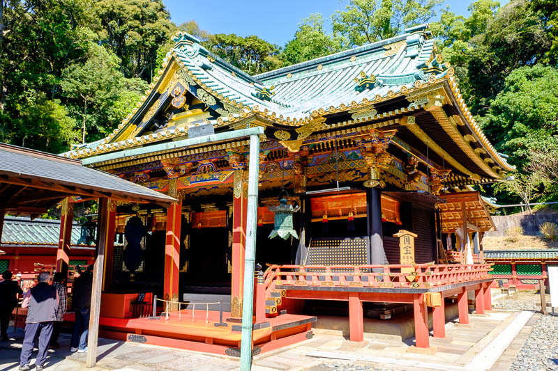 Japan-Shizuoka-Shrine-Kunozan Toshogu-Hiking - This is one of your red colorful temples. Theres a few varieties of Japanese temples. Wooden ones are worth more, check for concrete and steel with wo