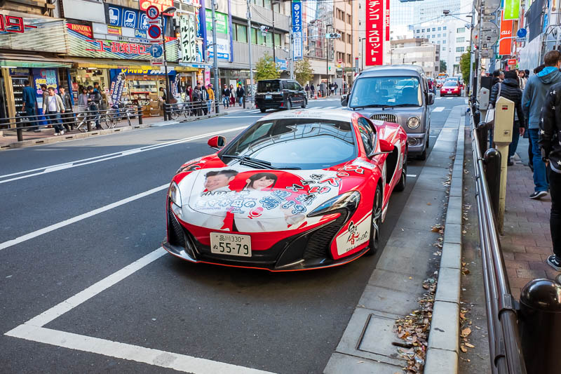Back to Japan for even more - Oct and Nov 2017 - This is a Mclaren, it is adorned with stickers advertising a show on the radio. So I took a photo. The owner was very unhappy that I did. So lets reca