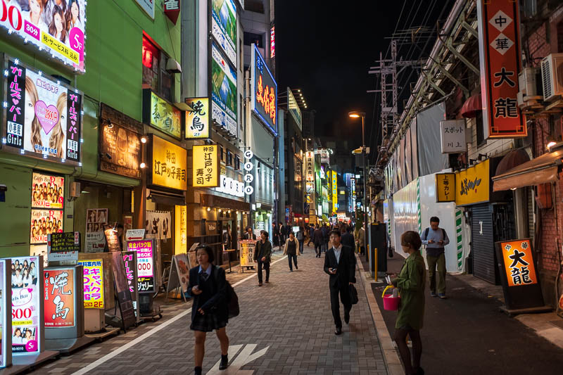 Japan-Tokyo-Akihabara-Ramen - Kanda is also quite a bright colorful place at night. A few junior wannabe Yakuza with the head sets and black gloves hanging around.