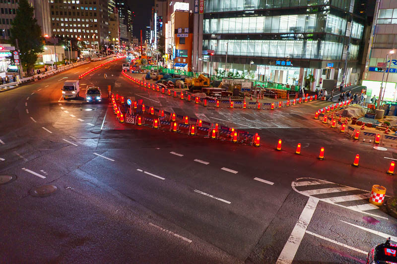 Japan-Tokyo-Food-Shinjuku - Japan takes temporary road lane markings very seriously, with these cool orange lights leftover from Halloween.