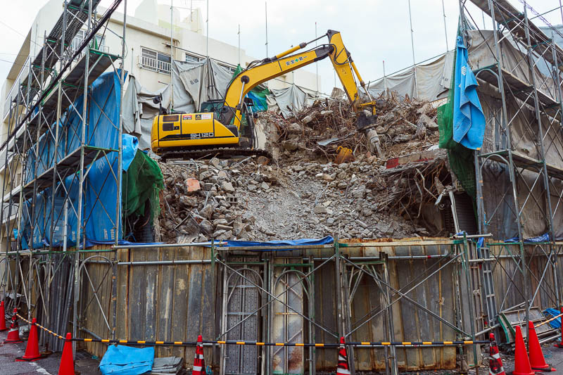 Of course I am back in Japan yet again - Oct and Nov 2018 - Near my hotel, a back hoe has climbed a pile of rubble. You dont really see this in Australia, but its very common all over Asia. They always look to 