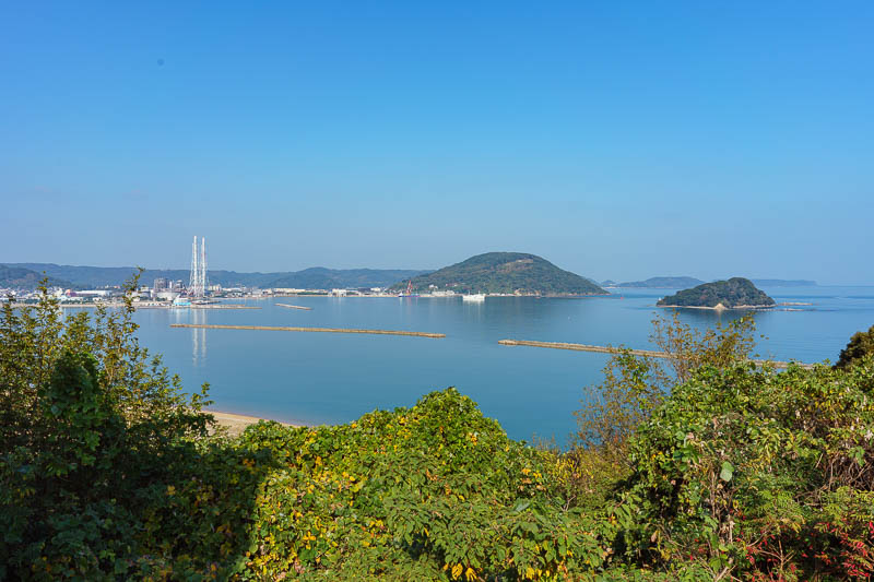 Japan-Karatsu-Castle-Hiking - Another shot of the bay, pollution not as bad from this angle. Those two chimneys are part of a huge industrial complex. Strange place to put it.