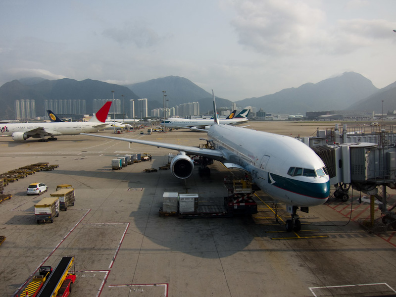 Hong Kong-Airport-Boeing 777-Lounge - First of all, the light was good and pollution low, so I took a photo of my plane, and many others, with the excellent mountains in the background. Ho