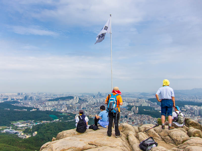 Korea-Seoul-Hiking-Gwanaksan - First summit, closest to Seoul, there are no guard rails anywhere, its a long way down off that rock. Getting to this part seemed to have no path at a