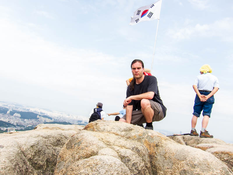 Korea-Seoul-Hiking-Gwanaksan - Its me, crouching down, I didnt really want to set the camera timer and step backwards off the cliff like so many idiots have done.