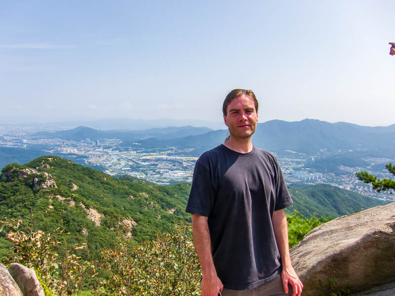 Korea-Seoul-Hiking-Gwanaksan - Me at the summit, a Korean guy took the photo for me and since he YELLED smile, I tried really hard.